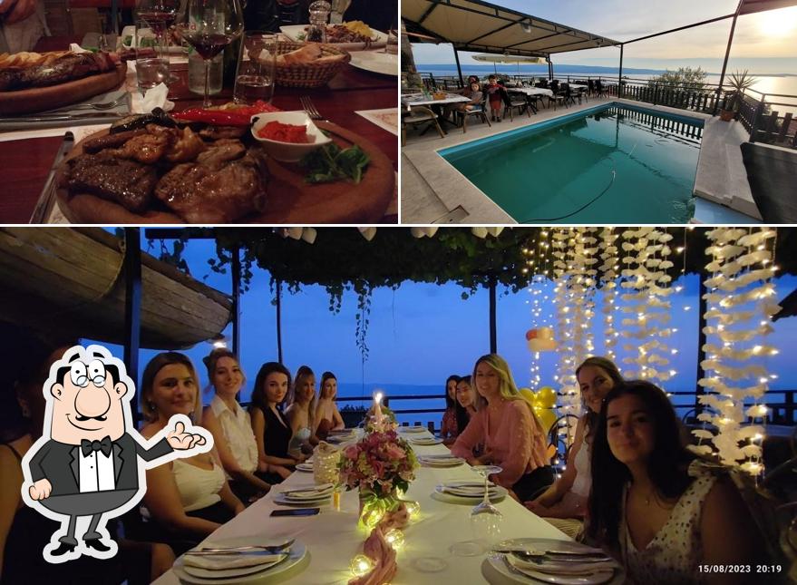 La immagine della interni e tavolo da pranzo di Konoba Bajso