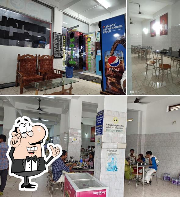 Take a seat at one of the tables at Hotel Ganapathi Bhavan