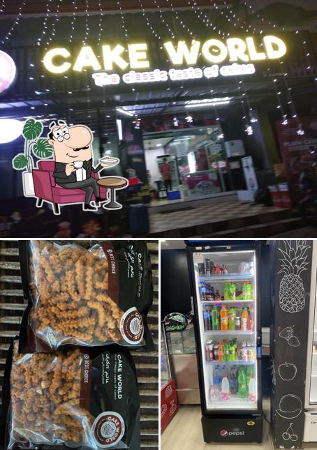 Among various things one can find interior and food at Cake World, Vithura