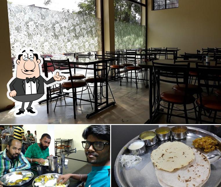 This is the image depicting interior and beverage at Shree Gayatri Bhojanalay