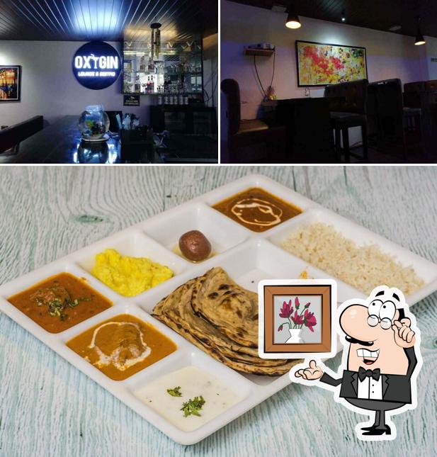 Take a seat at one of the tables at Oxygin Lounge & Bistro