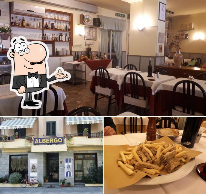 Siediti a un tavolo di Albergo Ristorante Il Cochino