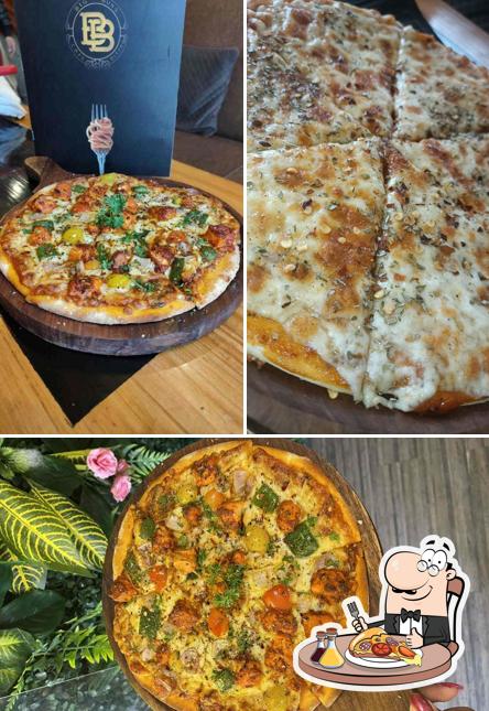 Try out pizza at Big Buns Café & Bistro