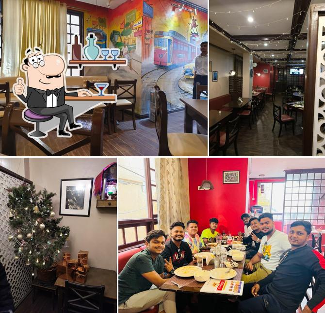 Take a seat at one of the tables at Cinnamon Restaurant