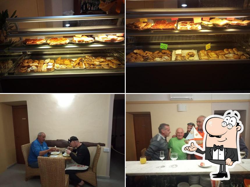 Guarda la foto che mostra la interni e cibo di Piglia e porta a casa - by RibaRbeach