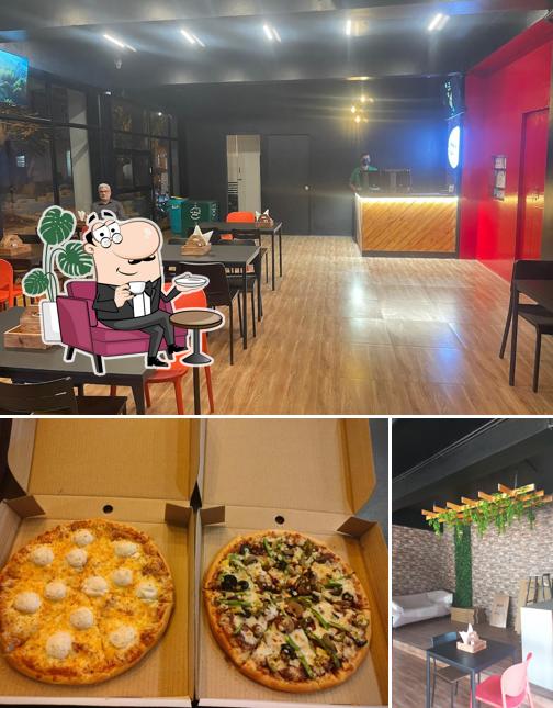 This is the image displaying interior and pizza at La Pino'z Pizza - Upkar Layout, Prashanth Extension, Whitefield