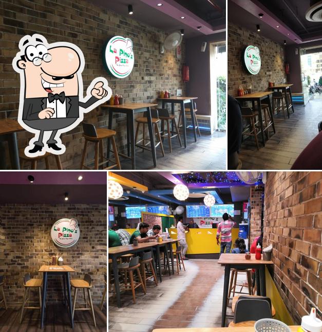 Take a seat at one of the tables at La Pino'z Pizza