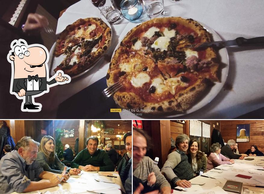 La immagine della interni e pizza di Le Noci