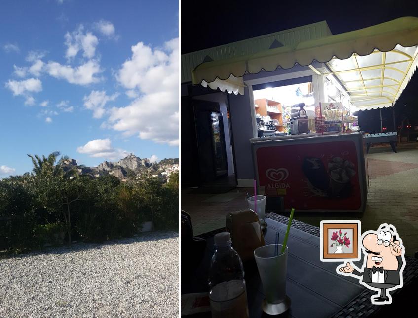 Siediti a un tavolo di Belvedere Cocktailbar