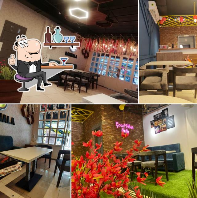 Take a seat at one of the tables at GRILL MASTERS