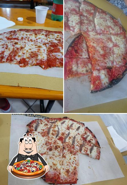 A Pizzeria Fuori Dal Ghetto, puoi goderti una bella pizza