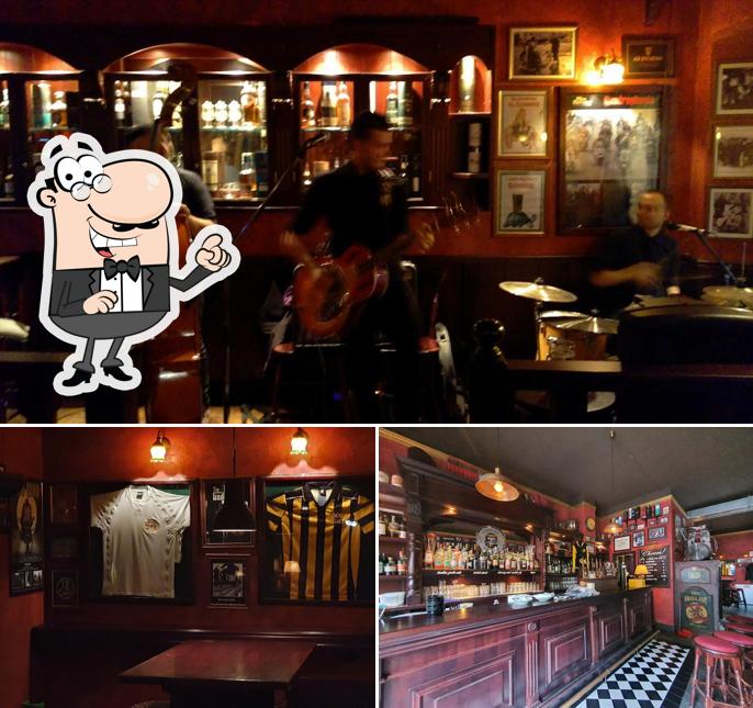 Siediti a un tavolo di The Small Axe Pub