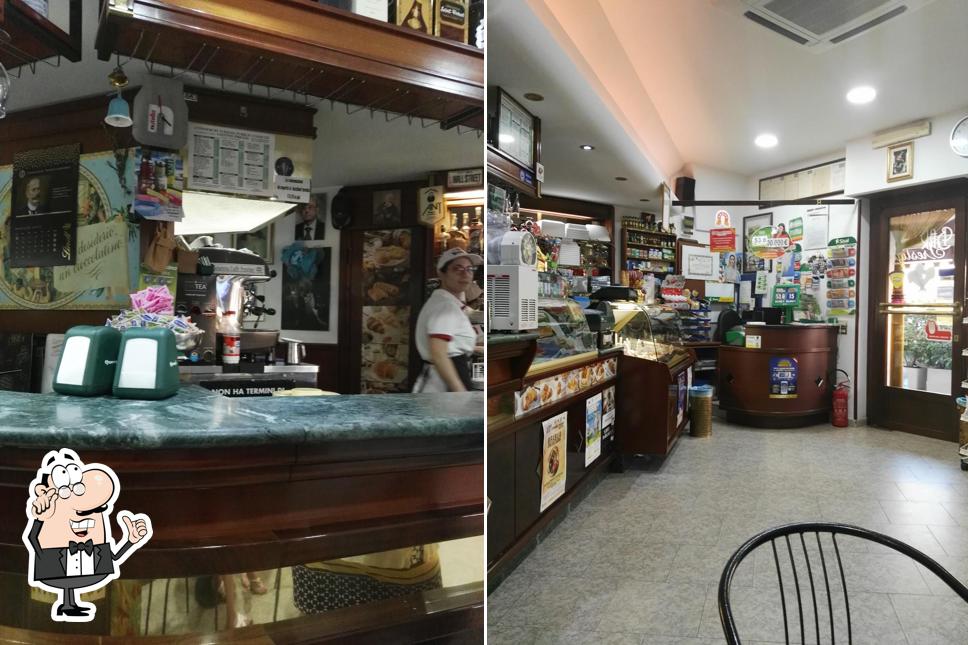 Dai un'occhiata agli interni di Bar Prestige