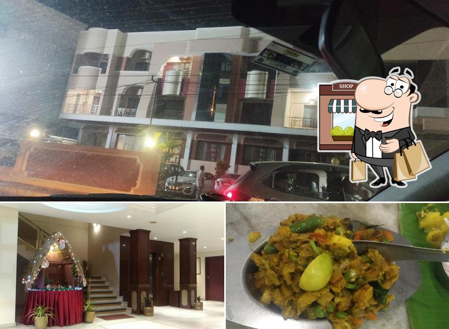 Among different things one can find exterior and food at Hotel Gnanam
