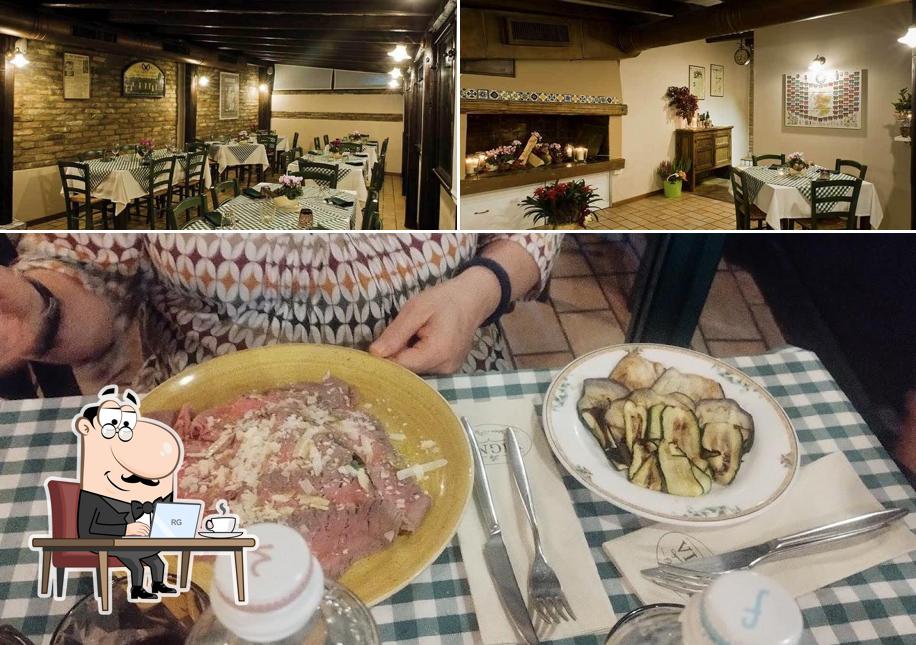 Questa è la immagine che mostra la interni e cibo di Osteria Pizzeria La Vigna