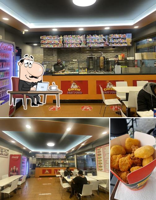Guarda la immagine che raffigura la interni e cibo di Chicken Fast Food