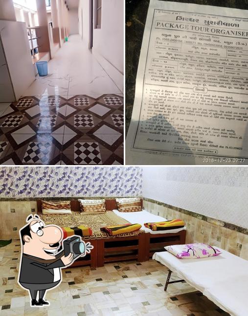 Look at the image of Girdhar Morari Gujarat Samaj, Guest House