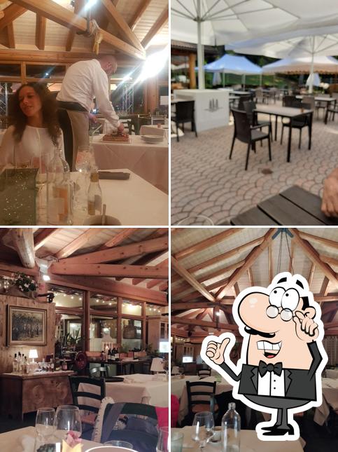 Dai un'occhiata agli interni di Ristorante Pizzeria Baita 7 Larici