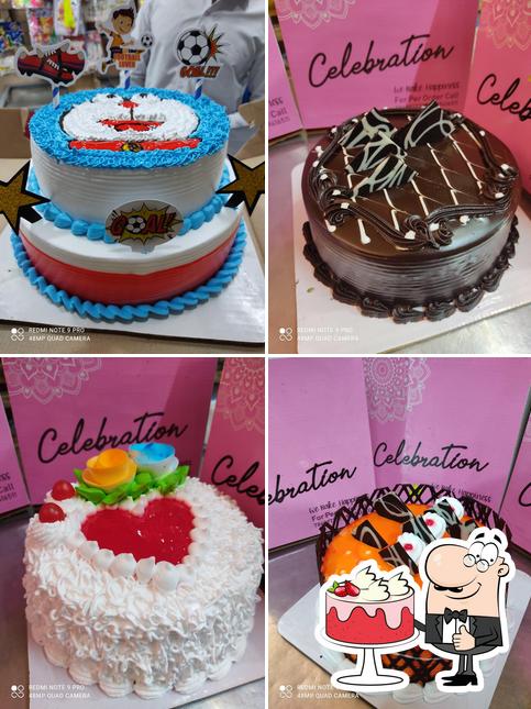 Look at the photo of Vijay sweets pizza home and celebration cake