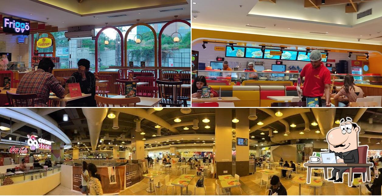 Take a seat at one of the tables at Haldiram's