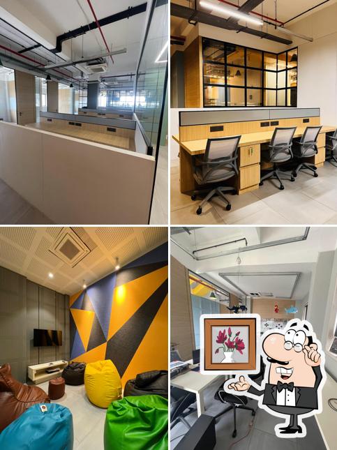 Take a seat at one of the tables at Blob CoWorking Space