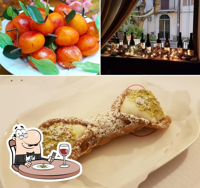 Questa è la foto che raffigura la cibo e vino di Pasticceria Pizzeria Cautela