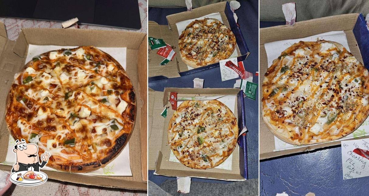 Get pizza at Cravings Corner