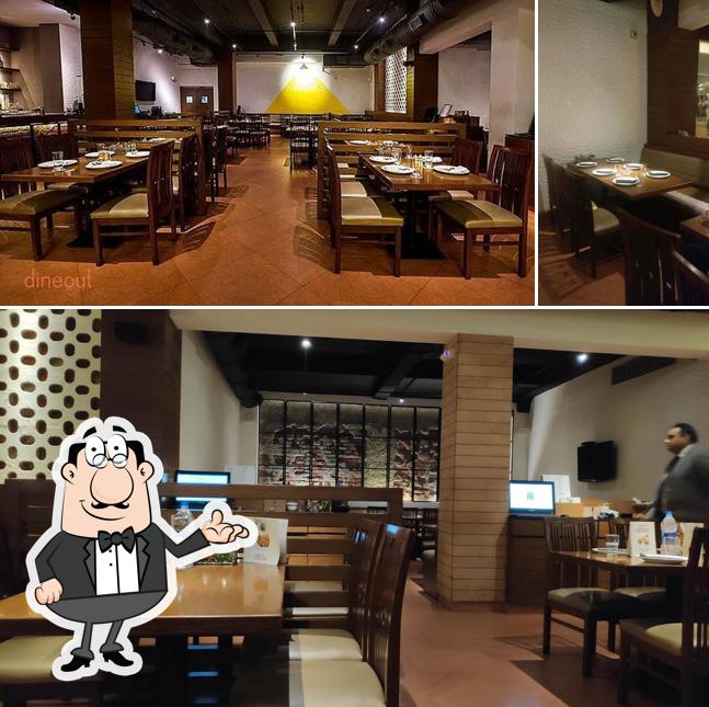 Take a seat at one of the tables at India Bistro Chembur