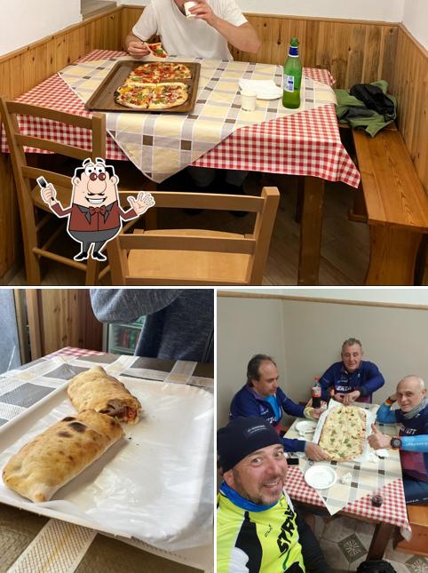 Guarda la foto che raffigura la cibo e interni di Pizzeria Al Fosso - Mordi e Fuggi