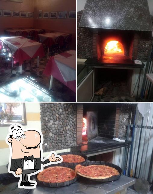 Dai un'occhiata agli interni di Pizzeria Da Vincenzo