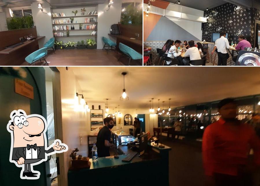 Take a seat at one of the tables at The Bungalow Cafe