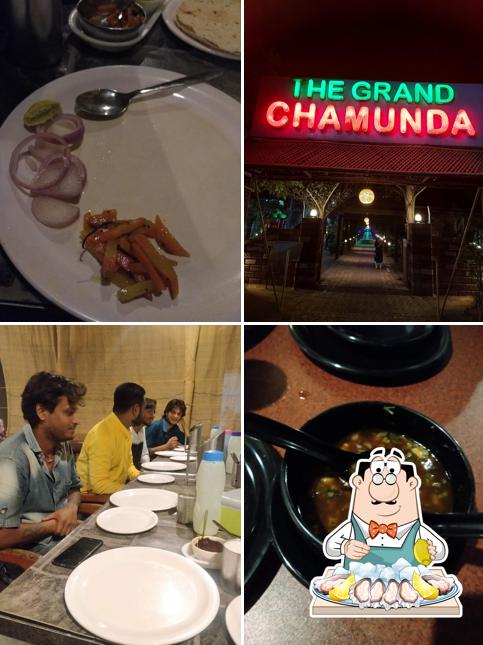 Try out seafood at The Grand Chamunda Restaurant