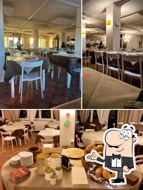 Dai un'occhiata agli interni di Pizzeria Al Colle