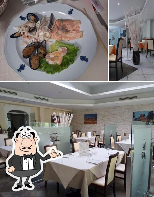 Siediti a un tavolo di La Rosa Blu Pizzeria Ristorante
