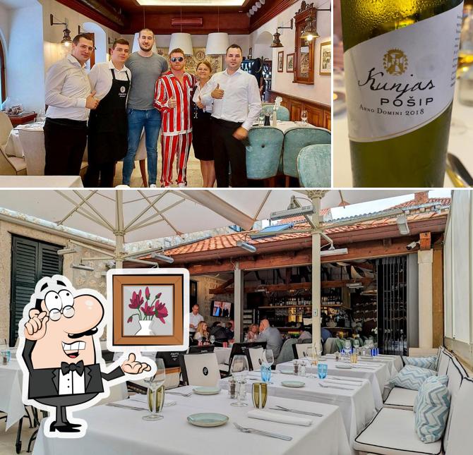La foto della interni e alcol di Fish Restaurant Proto