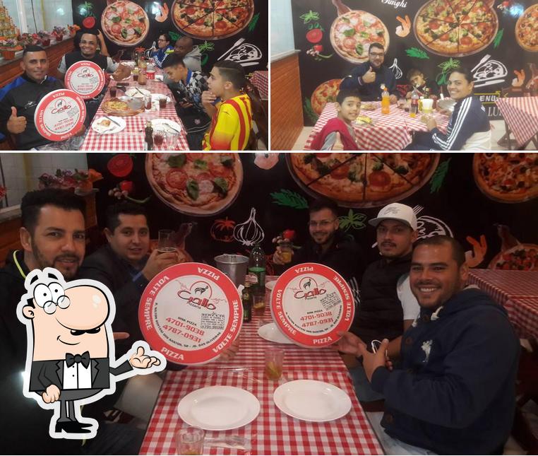 O interior do Gallo Pizzaria