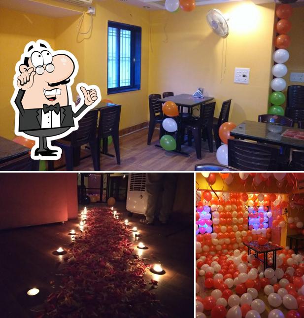 Take a seat at one of the tables at MeeT N TreaT Coffee Shop