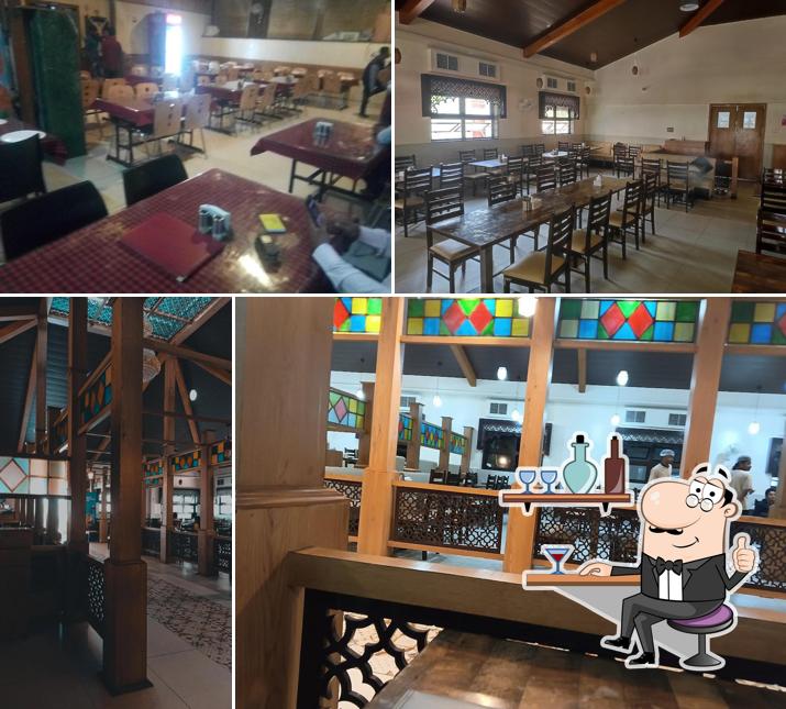 Take a seat at one of the tables at Shree Radha Krishna Pure Veg