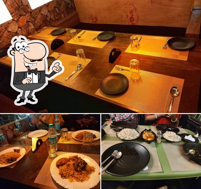 The picture of interior and dining table at Amropali Cafe Restaurant