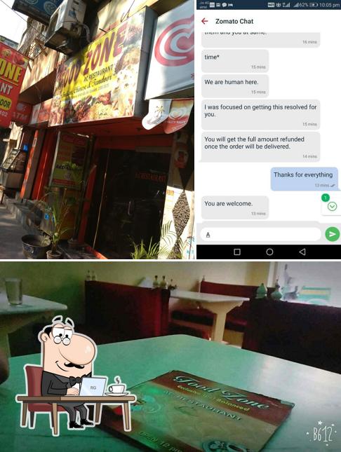 Take a seat at one of the tables at FOOD ZONE