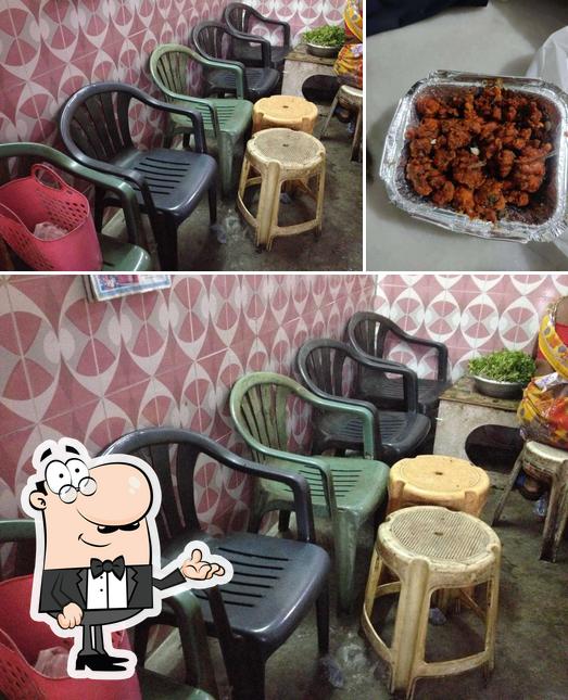 Among various things one can find interior and food at Khaja Baba Chicken Pakodi