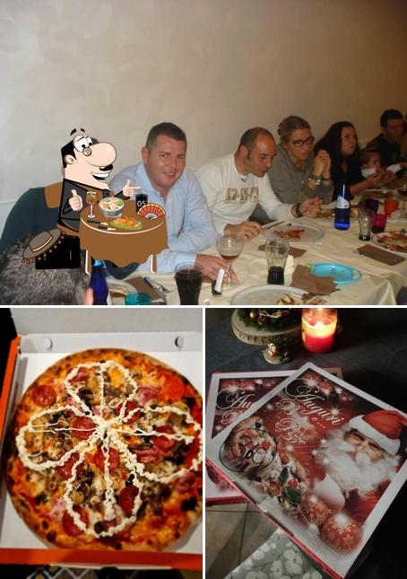 Tra le varie cose da The Brothers pizzeria d'asporto si possono trovare la cibo e interni