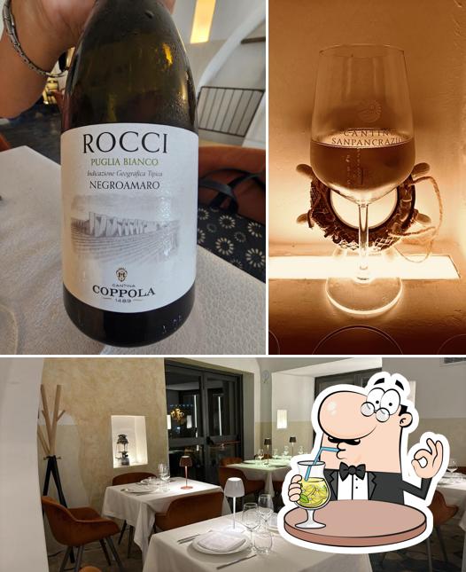 La immagine della bevanda e interni di Portaterra Restaurant & Lounge Bar