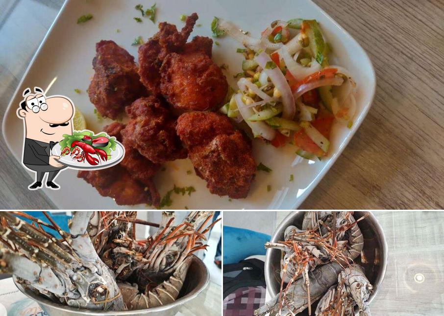 Order different seafood items available at Blu Oyster