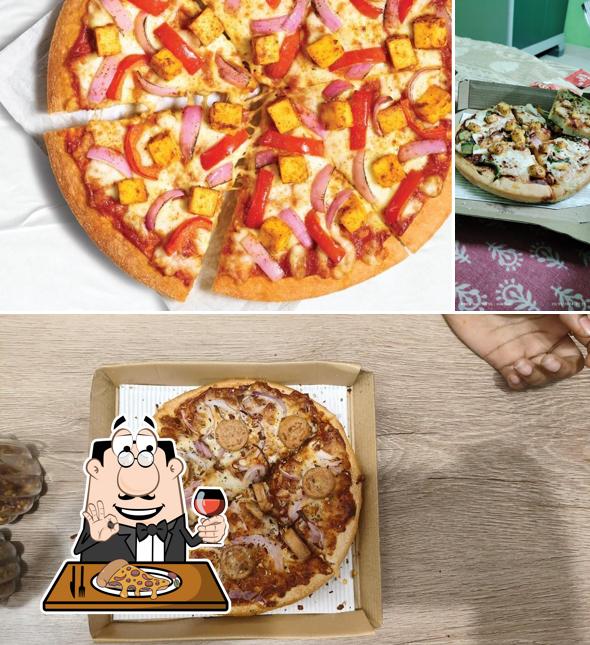 Pick pizza at Pizza Hut Minibypass, Nellore