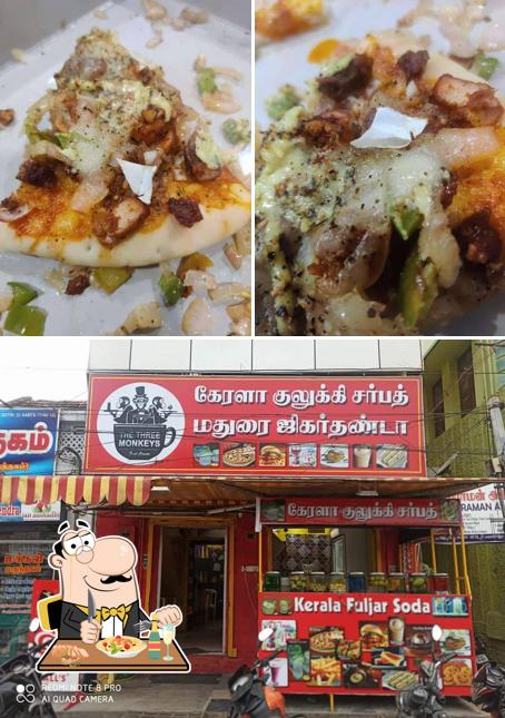 Check out the picture depicting food and exterior at The Three Monkey's Food Corner