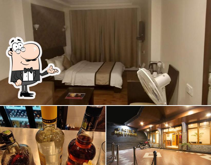 Take a seat at one of the tables at HOTEL SHER-E-PUNJAB & (Family Restaurant & Bar)