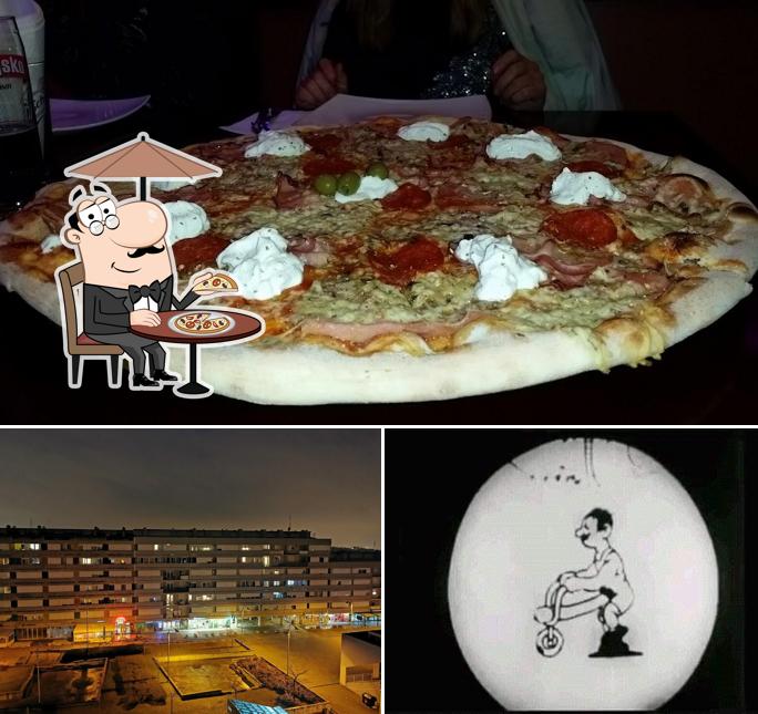 Guarda la immagine che mostra la esterno e pizza di La Capinera