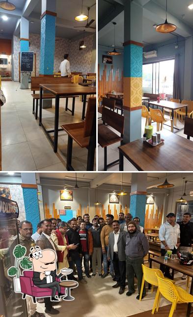 Take a seat at one of the tables at Nataraj South Indian Restaurant, The Taste of Tamilnadu(Sadar)