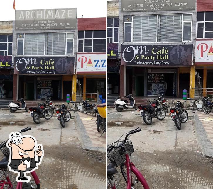 Look at the picture of Om Cafe & party hall